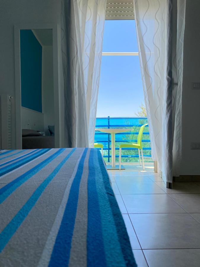 Frontemare Rooms Porto Cesareo Bagian luar foto